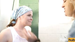 A teenage girl is being trained by a lesbian mentor in the garage