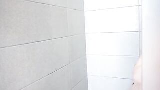 My stepsister is masturbating her pussy in the shower, loud as fuck