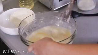 The stepmom taught the small-breasted stepdaughter to eat pussy in the kitchen