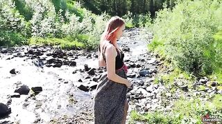 A cheerful teen redhead is fucking outdoors and gets creampied