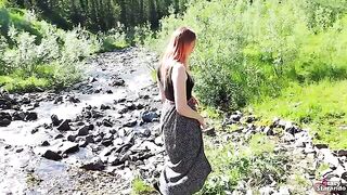A cheerful teen redhead is fucking outdoors and gets creampied
