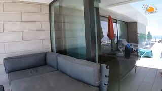 A blonde woman with socks fucks passionately with her boyfriend in the swimming pool