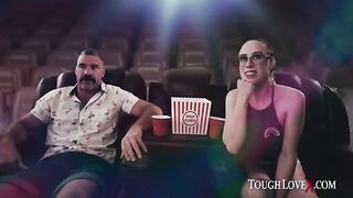 A girl is alone in the theater and she's touching herself, feeling so horny