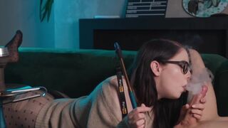 A cute nerdy girl with glasses gets fucked in 69 position and smokes cigarettes