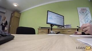 A business lady is trying to get a loan in the bank