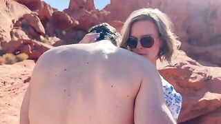 A daring woman fucks with her friend in front of her husband in the desert