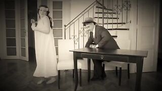 A naughty dancer gets a cumshot on her face in this retro scene