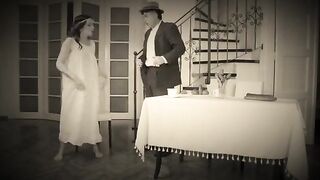 A naughty dancer gets a cumshot on her face in this retro scene