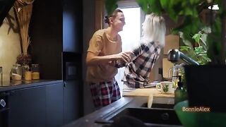 A passionate couple gets caught having sex in the kitchen
