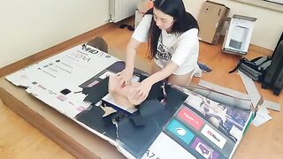 A hot stepsister fucks in her ass through a hole in the box