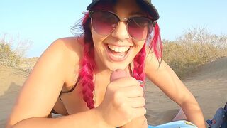 A girl is flashing her body on the Gran Canaria beach