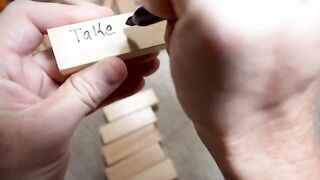 Cute girl Brooke Tilli playing board games with her stepbrother