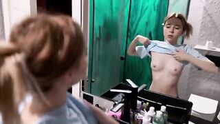 The pretty woman prepared a surprise for her boyfriend in the bathroom
