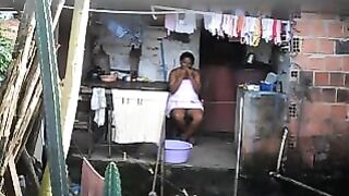 A black girl did not know that there was a hidden camera in the room