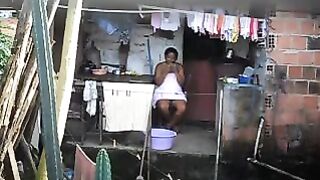 A black girl did not know that there was a hidden camera in the room