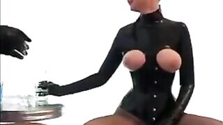 Lesbians in latex rubber suits fuck each other hard