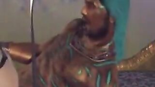 Brunette woman caresses herself on a big cock and moans