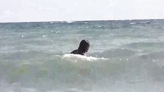 A group of girls sunbathing naked on the beach is quite a common sight