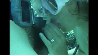 A man has sex with a woman with a hairy crotch underwater