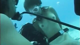A man has sex with a woman with a hairy crotch underwater