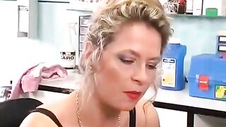 A girl plays with her new clitoris piercing