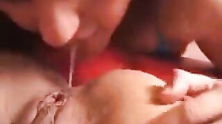 Two charming girls are engaged in anal rimming with passion