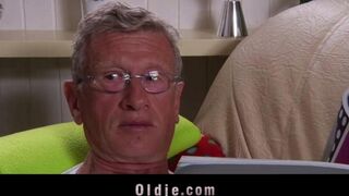 A hot blonde is getting fucked by an old man on the couch