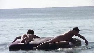 Nude beauties have fun on the beach without any clothes