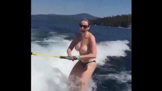 Topless girl skiing on the water, it was a great sight