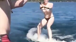 Topless girl skiing on the water, it was a great sight