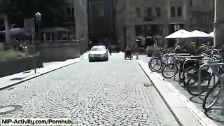 A young girl showed her cunt to all the people walking on the street