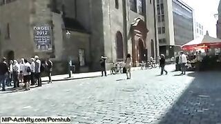 A young girl showed her cunt to all the people walking on the street