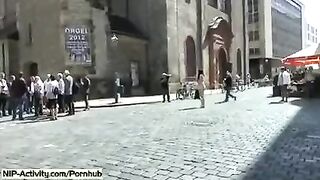 A young girl showed her cunt to all the people walking on the street