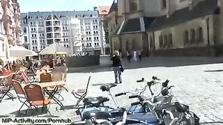 A young girl showed her cunt to all the people walking on the street
