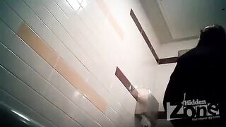 Camera secretly filmed in the woman's toilet. Private moment peeping