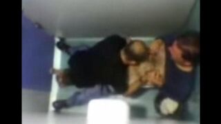A camera left in the toilet captured some gay guys getting intimate