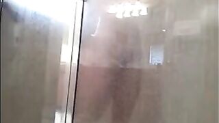 The man washed his body in the shower, not suspecting a thing