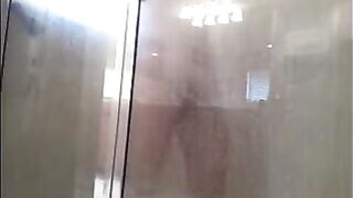 The man washed his body in the shower, not suspecting a thing