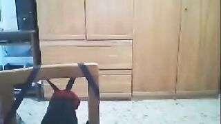 A hot woman fucks in front of her husband's webcam
