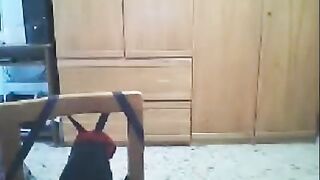 A hot woman fucks in front of her husband's webcam