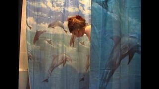 A husband secretly shoots his naked wife in the bathroom with a camera