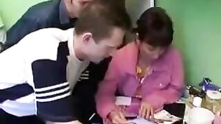 Russian mature gets fucked by three guys at once