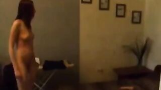 A cute Russian babe masturbates in the kitchen, all alone