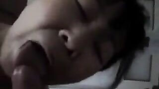 A Chinese woman practices her blowjob skills on him in a steamy scene