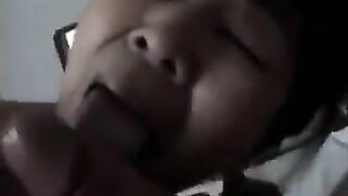 A Chinese woman practices her blowjob skills on him in a steamy scene