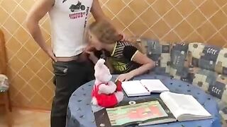 Instead of studying, a cute schoolgirl gets fucked in the kitchen