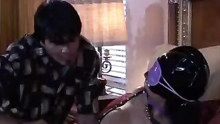 The mistress plays a BDSM game with her slave and brings him to orgasm