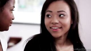 A black woman makes lesbian love with her sister on the bed