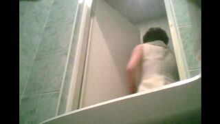 A hidden camera in the toilet captures a graduate's private moment