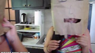 The girls wore bags on their heads and fucked with guys in an orgy